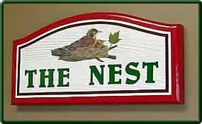 The Nest Cedar Signs